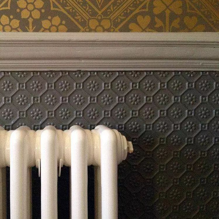 Embossed wallpaper used as wainscot